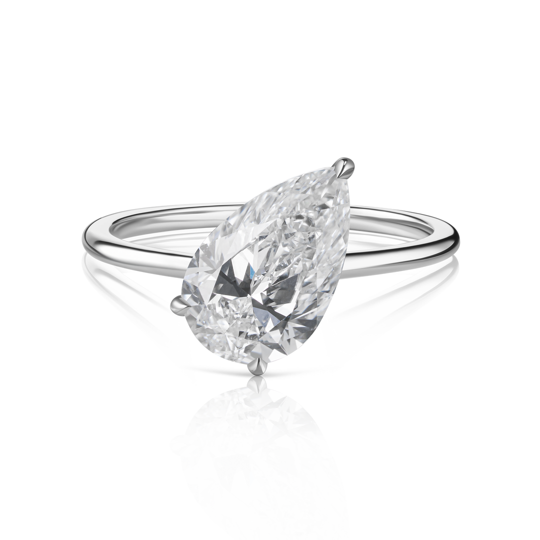 Large Floating Pear Diamond Ring