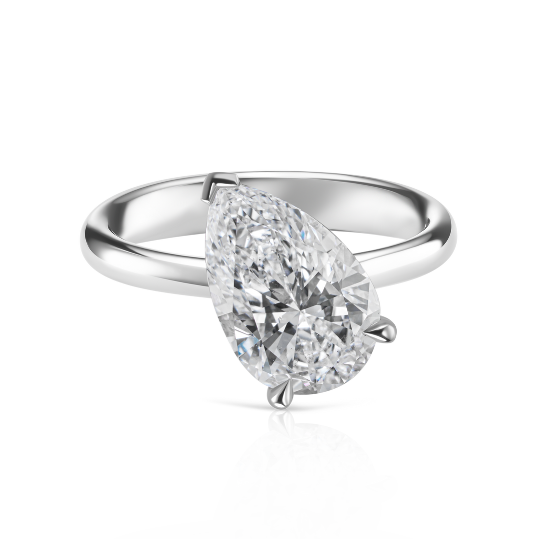 Tilted Pear Shape Diamond Ring