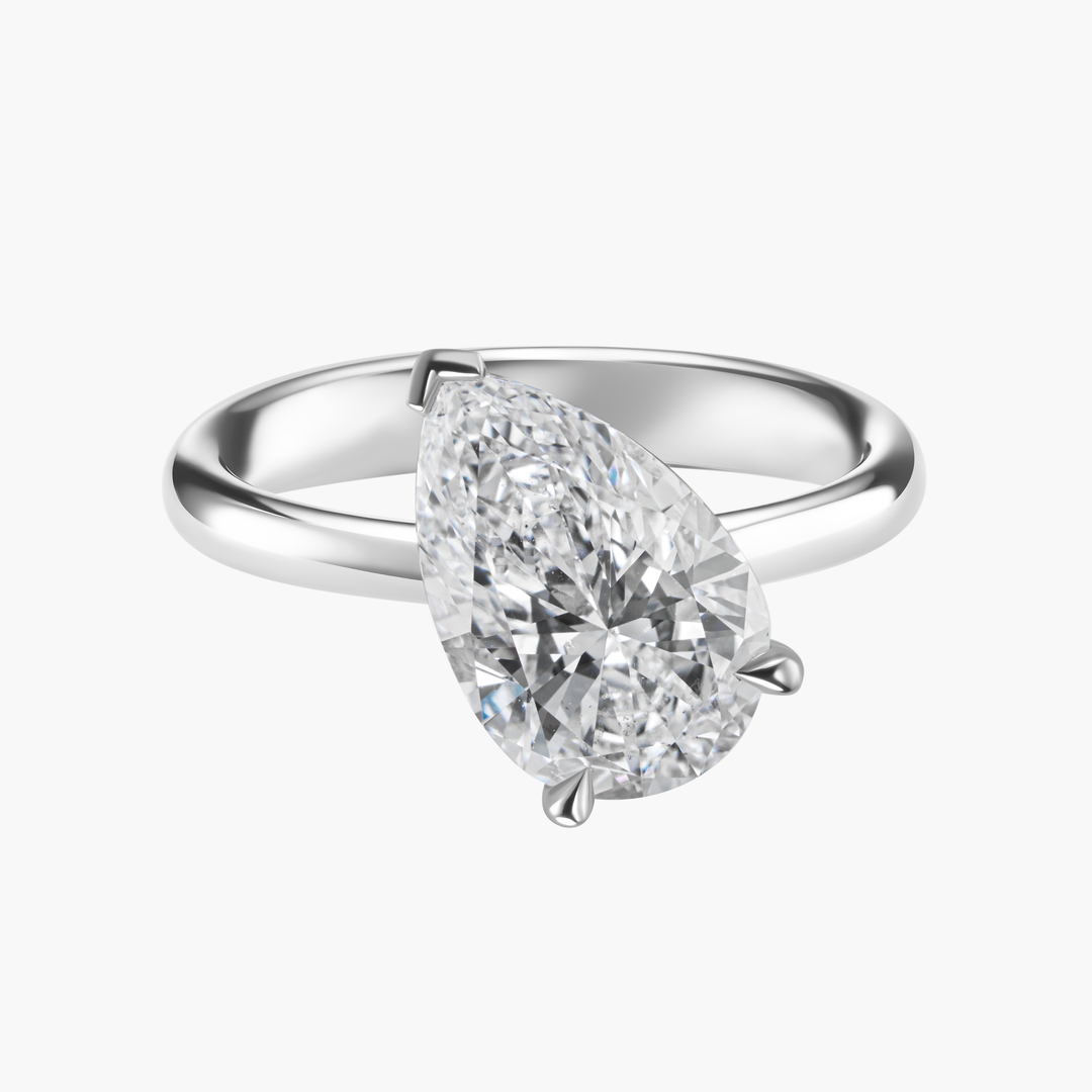 Tilted Pear Shape Diamond Ring